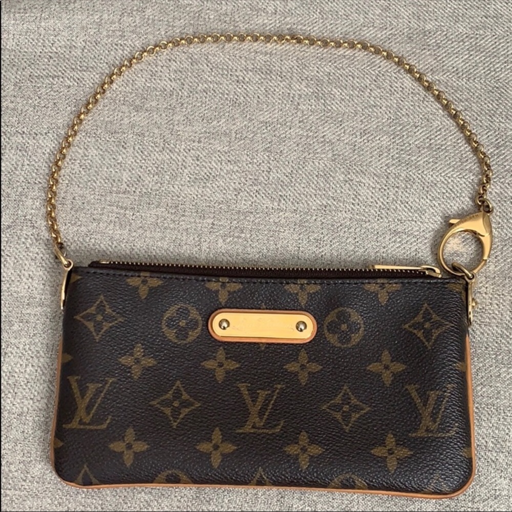 AUTHENTIC LOUIS VUITTON MILA MM CLUTCH